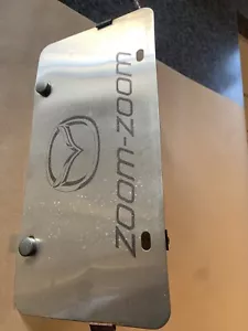 MAZDA OEM 99-2005 Miata FRONT License Plate Bracket W SS ZOOM ZOOM DISPLAY PLATE - Picture 1 of 5
