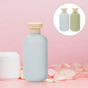 Botella de lavado de aguacate de 2 piezas botellas de viaje esenciales recargables para champú - Imagen 1 de 12