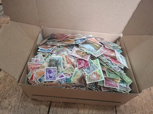 Small box of stamps off paper. Over 1000 stamps - Picture 1 of 4