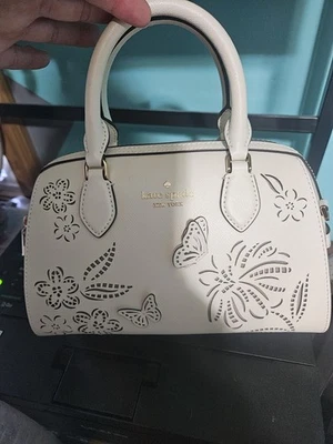 Kate Spade New York Madison Perforated Small Dolly Duffle (Butterfly)  Meringue - Image 1 of 4