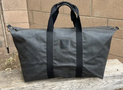 "BOLSO DE VIAJE DUNHILL GRIS RECUBIERTO DE LONA Y CUERO EXTRA GRANDE 28x17""" Foto 1 de 4