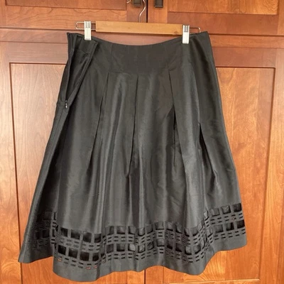 Falda plisada negra de seda pura Talbot con recortes en el dobladillo. Talla 10. Formal, Boda, Lux Foto 1 de 4