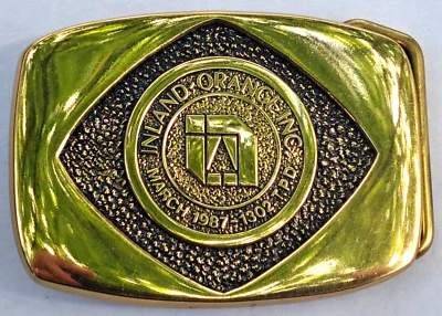 fivela de cinto de latão INLAND ORANGE INC 1987 seminova - Imagem 1 de 4