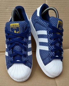blue and white shell toe adidas