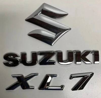 Комплект отделки задней двери багажника 2008 Suzuki XL-7 с эмблемой - Изображение 1 из 4