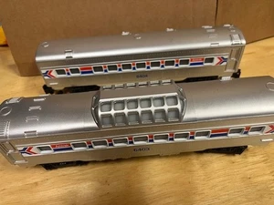 LIONEL - O Gauge - 6403 (Dome) + 6404 - 2 AMTRAK LIGHTED PASSENGER CARS! - Picture 1 of 17