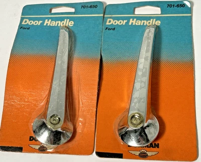 Par de manijas de puerta cromadas interiores para Ford Dorman 701-650 NOS Foto 1 de 4