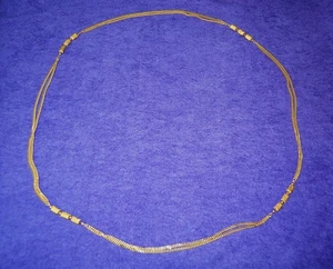 Collar Doble Cadenas con cuatro secciones de tres cuentas alargadas en Tono Dorado - Imagen 1 de 4