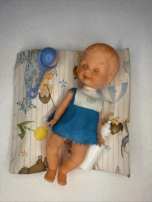 Biberón y sonajero articulados para dormir muñeca bebé de colección Foto 1 de 4