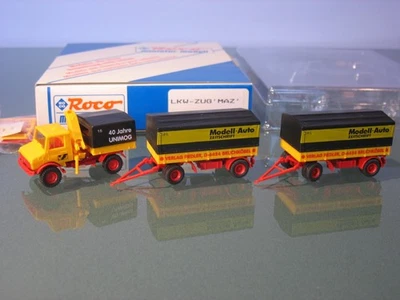 █► Unimog + 2 Anh. MAZ Modell-Auto Zeitschrift VF Fiedler Wg 15+16 Roco 1:87 OVP - Bild 1 von 2