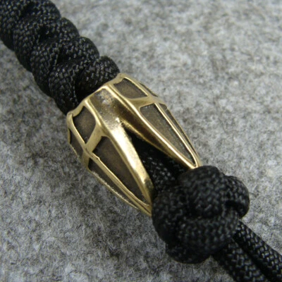 Cuchillo de latón macizo con cuentas de cordón cruzado cuentas paracord cordón hecho a mano con cuentas Foto 1 de 4