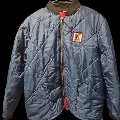 Chaqueta acolchada vintage años 70/80 marca K Penguin talla mediana hecha en EE. UU. azul marino Foto 1 de 4