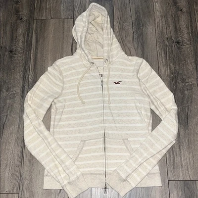 Sudadera con capucha Hollister crema clara a rayas talla grande Foto 1 de 3
