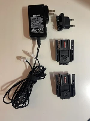 Cargador de batería Hotronic con 2 clips de montaje. Usado, probado  Foto 1 de 2