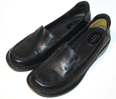 Zapatos planos sin cordones Clarks artesanales para mujer 9 M de cuero negro Mill Town 82728 usados en excelente estado Foto 1 de 4