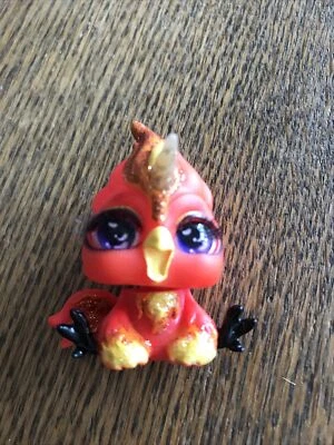 Figura de juguete Poopsie Cutie Tootie pájaro rojo fénix unicornio pestañas enraizadas 1,5" Foto 1 de 4