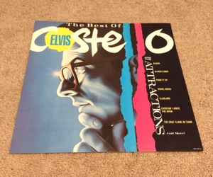 Póster casi nuevo The Best of Elvis Costello cuadrado plano de 2 caras 1985 promoción 12x12 RARO - Imagen 1 de 2