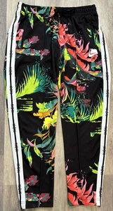 Pantalones de chándal Nike Sportswear NSW tropicales florales para hombre grandes con cremallera al tobillo - Imagen 1 de 6