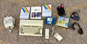 GRAND JOBLOT VINTAGE COMMODORE AMIGA 600 CONSOLE DE JEUX ET ACCESSOIRES, FONCTIONNE - Photo 1/20