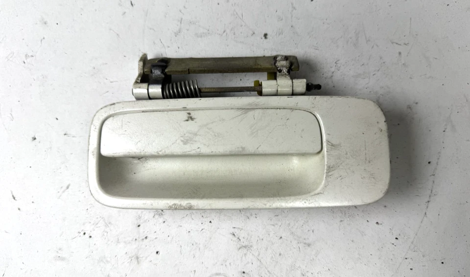 Manija exterior trasera izquierda Toyota Avalon 2000-2004 blanco perla Foto 1 de 4