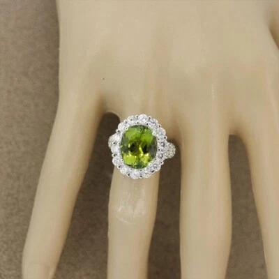 Simulated 6.51 TCW Oval Peridot & White Sapphire Halo Engagement Ring For Woman - Image 1 of 4