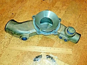 3003209 CUMMINS WATER PUMP COVER MANIFOLD NOS - Picture 1 of 7