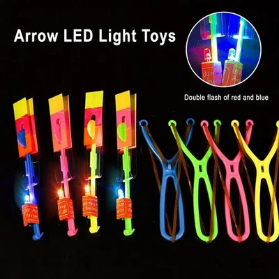 20x Flying toys Flash LED Arrow & Plastic Slingshot Luminous Rocket - Image 1 of 4