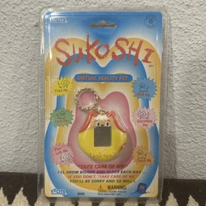 SuKoshi Virtual Reality Haustier gelber Hund Excite 1997 Neu im Karton Vintage digitales Spielzeug - Bild 1 von 11