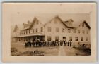 Rppc Large Boarding House Men Workers Loggers Dog Chef In Window Postcard I25