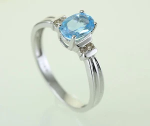 OVAL FACETED SWISS BLUE TOPAZ 14KT WHITE GOLD RING WITH 4 DIAMONDS - Picture 1 of 2