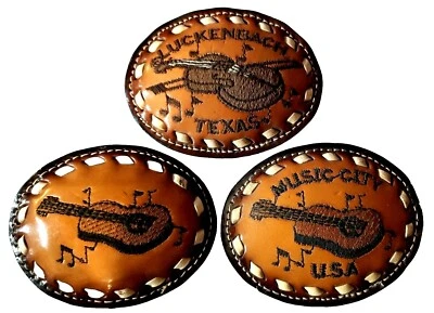 GUITARRA LUCKENBACH Hebilla de Cinturón MÚSICA CIUDAD EE. UU. TEXAS con Cuero Blanco POSITURA Foto 1 de 4