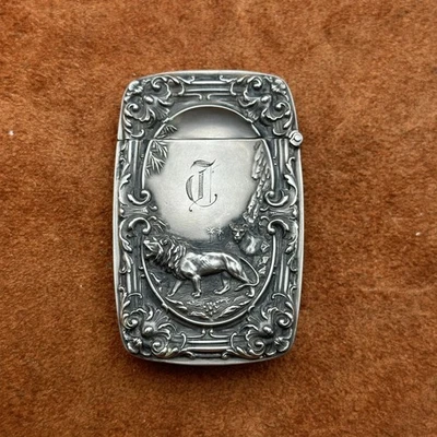 ANTIGUA CAJA FUERTE REPOSADA ESTERLINA - DISEÑO DE LEÓN Y CACHORROS ¡¡HERMOSA!!! Foto 1 de 4