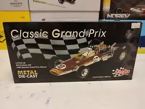 QUARTZO 1:18 LOTUS 49 SPANISH GRAND PRIX WINNER 1968 #10 GRAHAM HILL - Foto 1 di 17