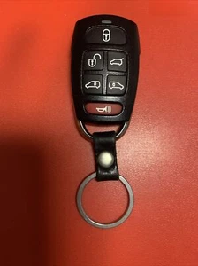 2007-09 HYUNDAI ENTOURAGE keyless entry remote fob transmitter SV3-100060235 OEM - Picture 1 of 3
