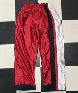 Pantalones deportivos holgados reversibles Nike Hoops de colección rojos negros blancos para hombre talla pequeña - Imagen 1 de 8
