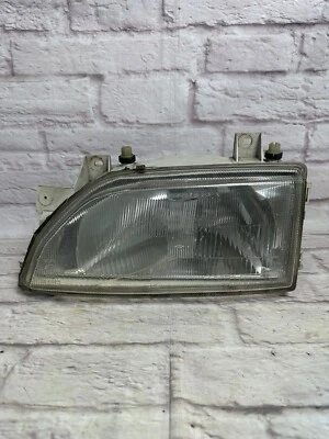 Faro lateral izquierdo pasajero delantero ford escort mk6 1995 Foto 1 de 4