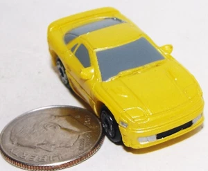 Small Micro Machine Plastic Mitsubishi 3000 in Yellow - Picture 1 of 3