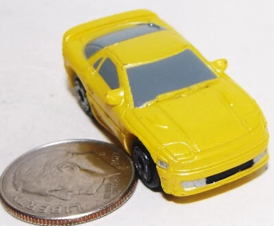 Small Micro Machine Plastic Mitsubishi 3000 in Yellow - Image 1 of 3