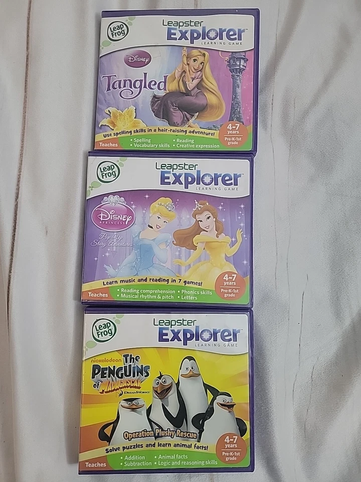Leap Frog Leapster Explorer Games Disney Princess & Tangled Penguins  Madagascar - Image 1 of 4