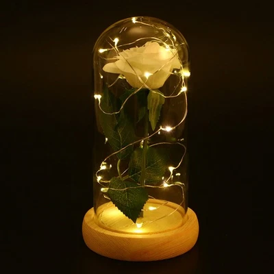 Soie blanche rose et lumière LED dans un en verre sur une base en bois - Image 1 of 4