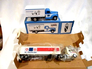 2 Druckguss Fahrzeuge General Motors Motto Neu in OVP - Bild 1 von 6