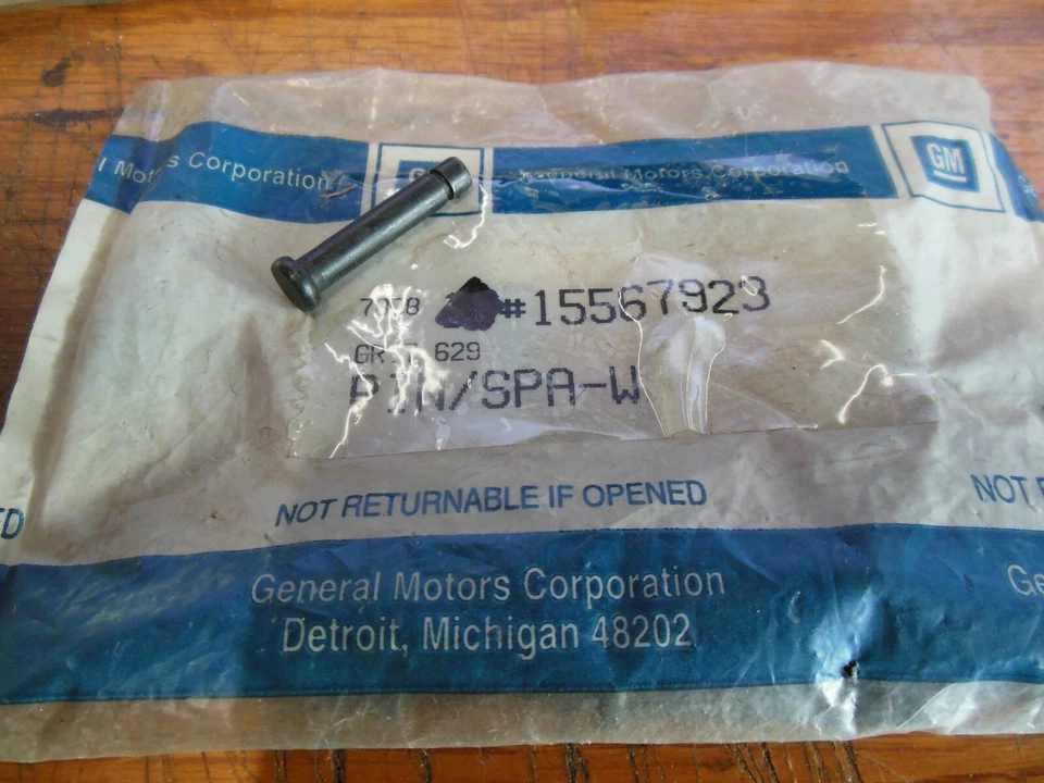 Pin de eje de polipasto de neumático de repuesto OE GM 15567923 para algunas aplicaciones de camiones y furgonetas 83-18 GM. Foto 1 de 1
