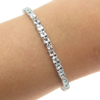 Brazalete de plata de ley 925 con diamantes reales y topacio azul talla princesa 7,25" Foto 1 de 4