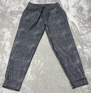 Pantaloni Lululemon Jet Crop Luxtreme taglia M nero grigio coulisse jogger orlo con polsini - Foto 1 di 11