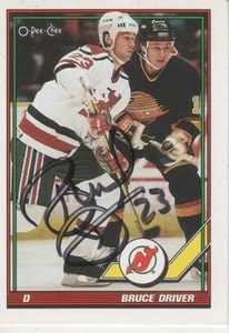 BRUCE DRIVER FIRMADO 1991-92 O-PEE-CHEE #294 - NUEVA CAMISETA DEVILS - Imagen 1 de 1
