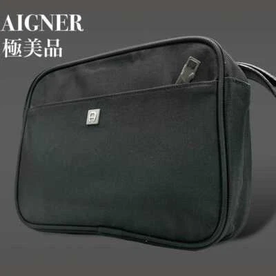 Bolso sin asas AIGNER logotipo lona cuero negro unisex para mujer USADO DE JAPÓN Foto 1 de 4