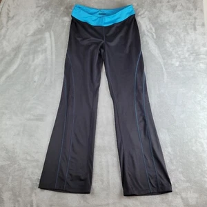 Pantalones Fila para mujer 28x30 negros piernas acampanadas cintura elástica ropa deportiva - Imagen 1 de 12