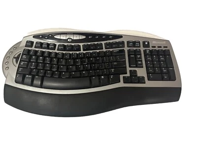 MICROSOFT  WIRELESS COMFORT KEYBOARD 1045, BATTERY POWERED, ERGONOMIC DESIGN - Image 1 of 4