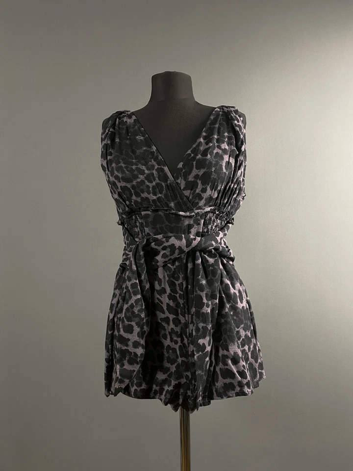 Mono mameluco Free People FP Movement Jog It Off púrpura estampado de leopardo talla XS-S Foto 1 de 4