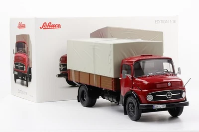 1:18 Schuco Mercedes Benz L911 pianale / aereo camion rubino rosso 1966... - Immagine 1 di 4